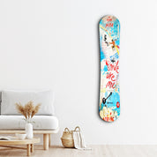 Colorful snowboard glass wall art by Artdesigna featuring a vibrant design, perfect for modern snowboard-themed home decor.