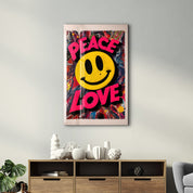 Colorful glass wall art featuring a peace love and smile graffiti design by Artdesigna, mounted on a wall.
