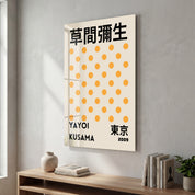 Yayoi Kusama yellow polka Japanese pop art glass wall art by Artdesigna, featuring vibrant yellow polka dot design on clear glass.
