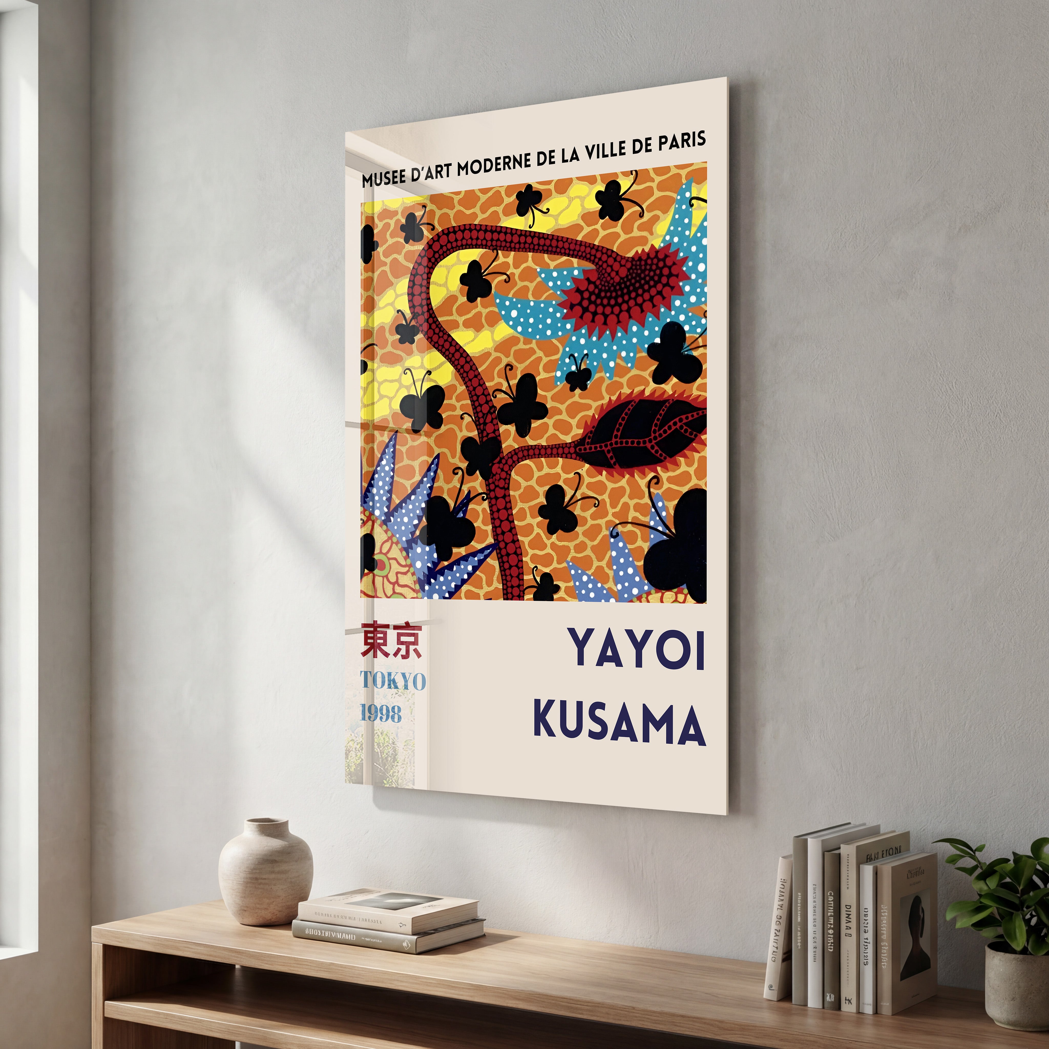 Glass wall art featuring Yayoi Kusama's floral butterflies design, vibrant Japanese pop art by Artdesigna.