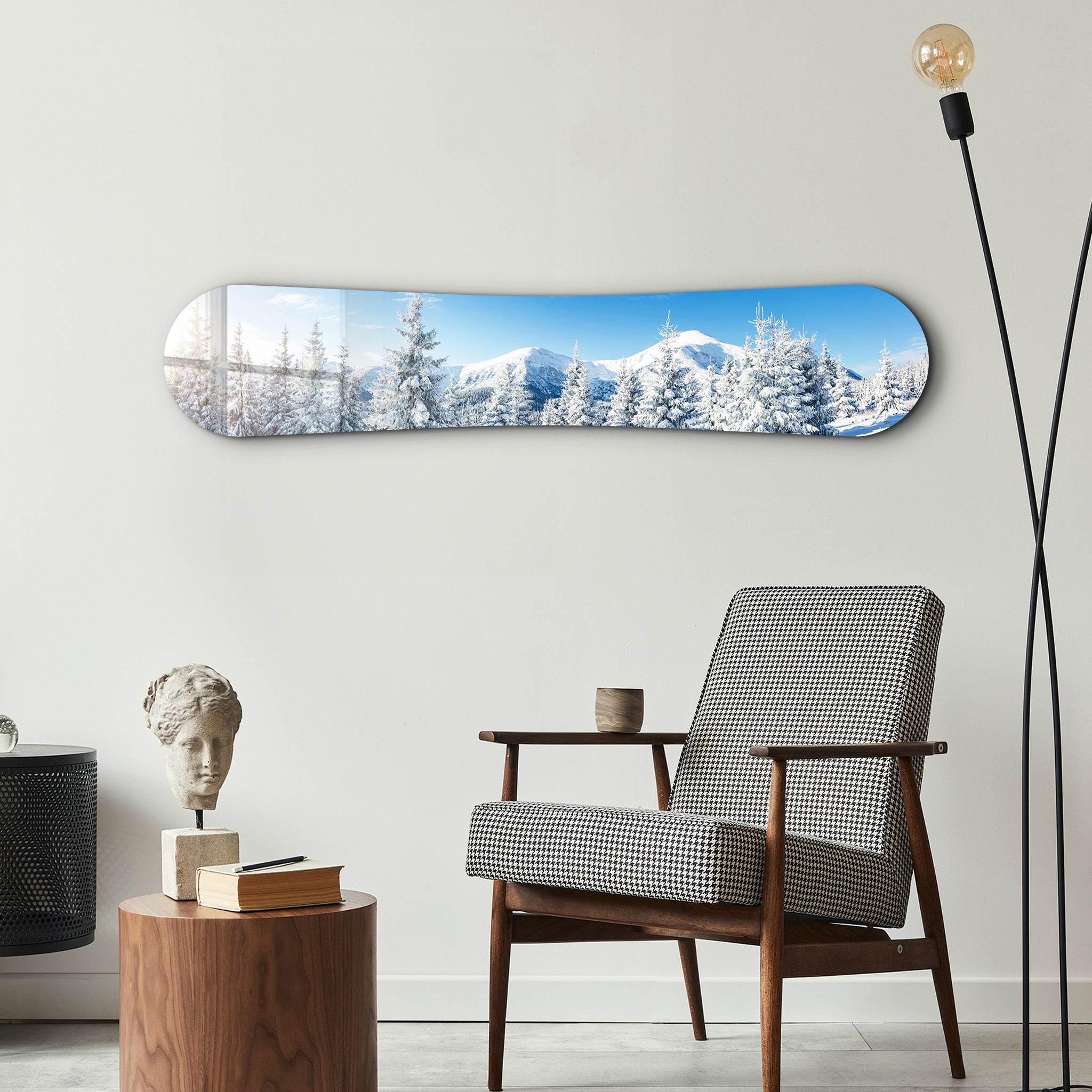Snowy alpine landscape glass wall art by Artdesigna, featuring a mountain scene with snow-covered peaks and clear blue sky.