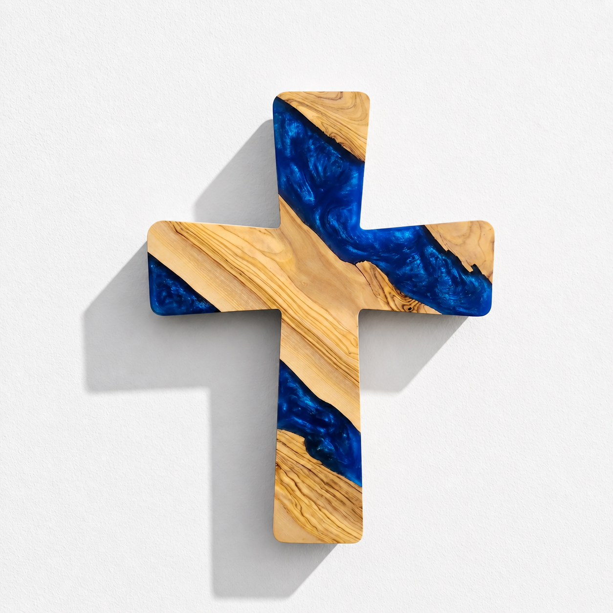Handmade olive wood and artistic resin wall cross, wood wall art by Artdesigna, featuring natural textures and intricate design.