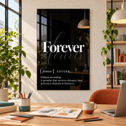 Forever Definition glass wall art by Artdesigna, black and white typography print in a home office