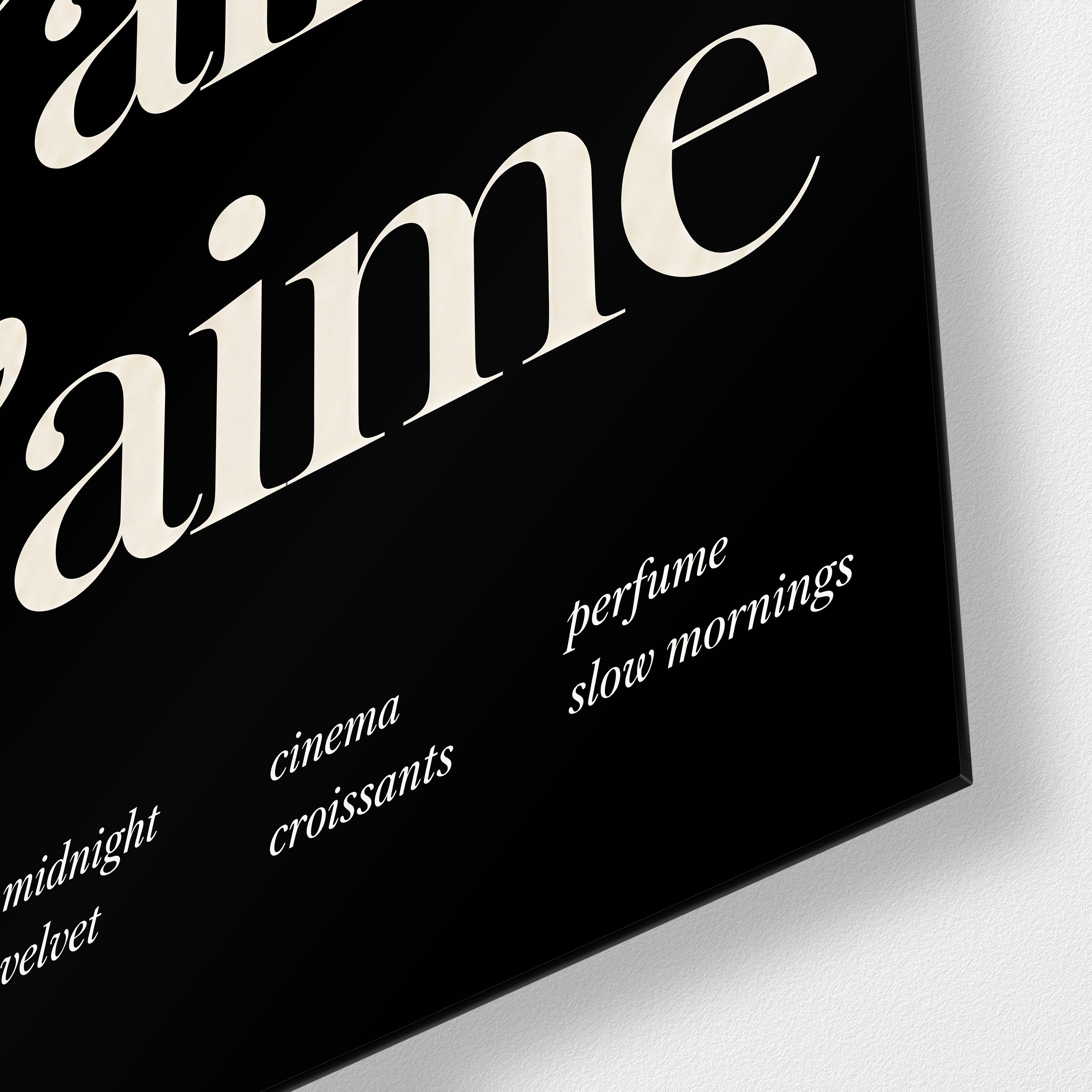 Close-up of Je T'aime glass wall art by Artdesigna featuring elegant lettering design