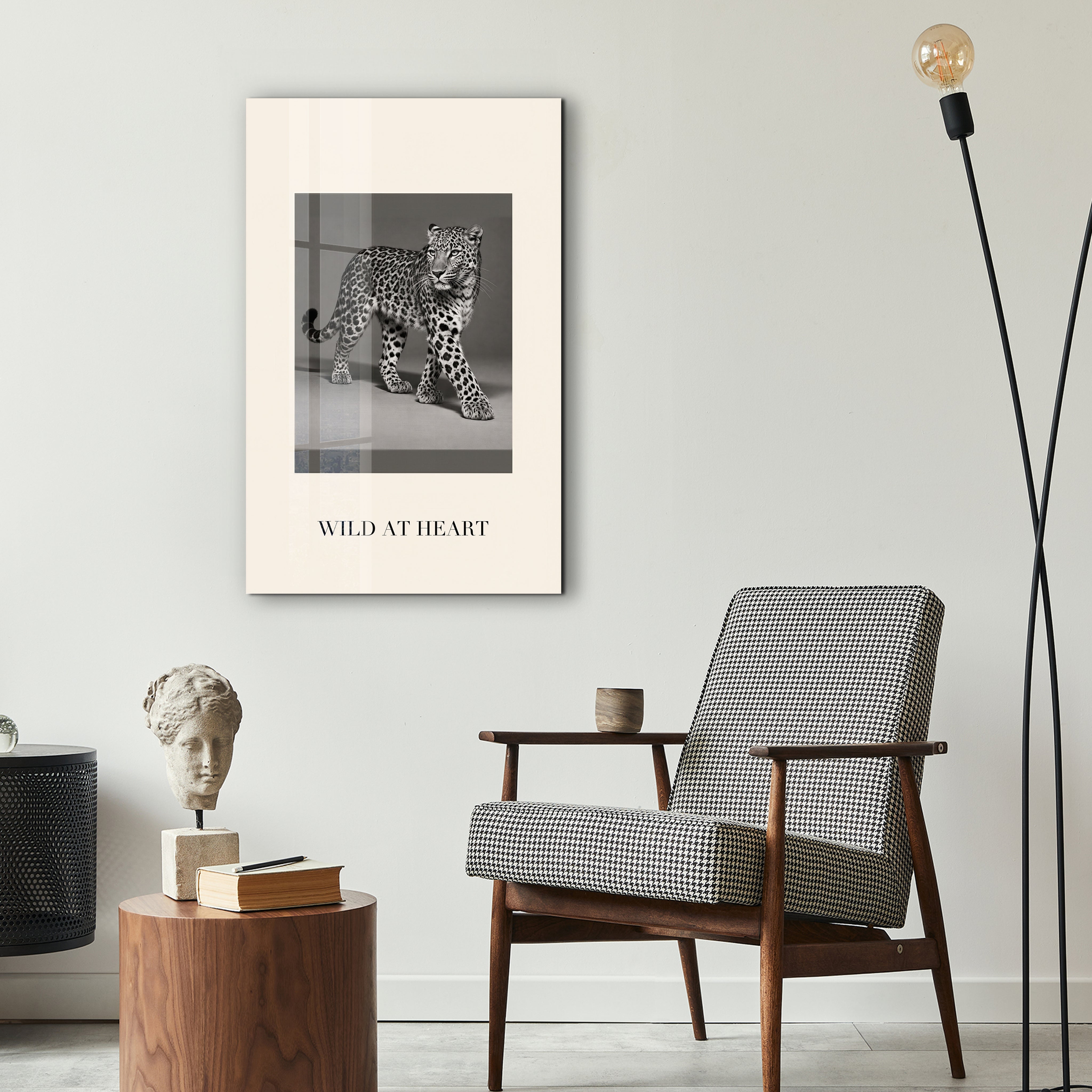 Wild at Heart leopard portrait glass wall art by Artdesigna displayed in a stylish interior