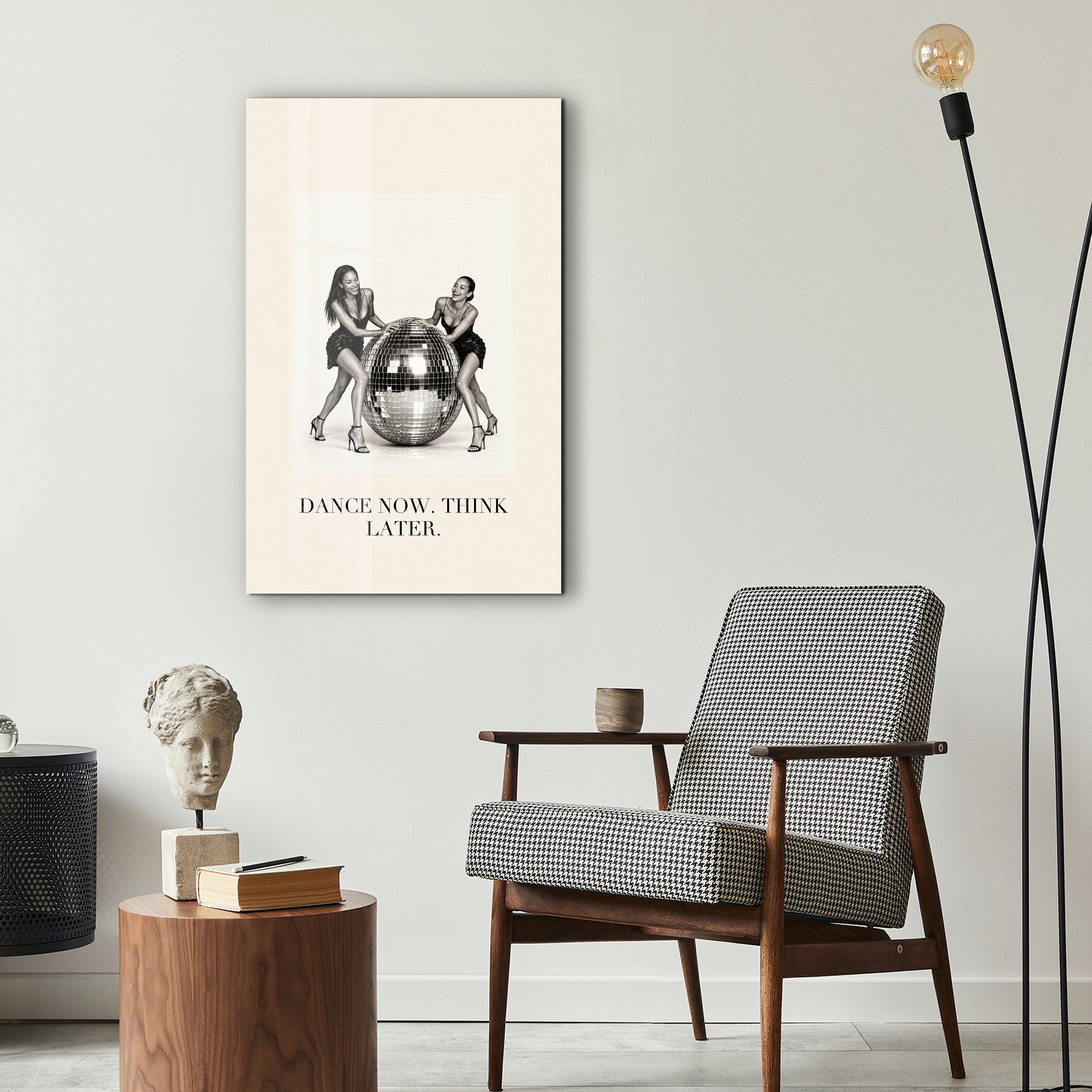 Dance Now, Think Later glass wall art by Artdesigna displayed in a stylish interior décor setting