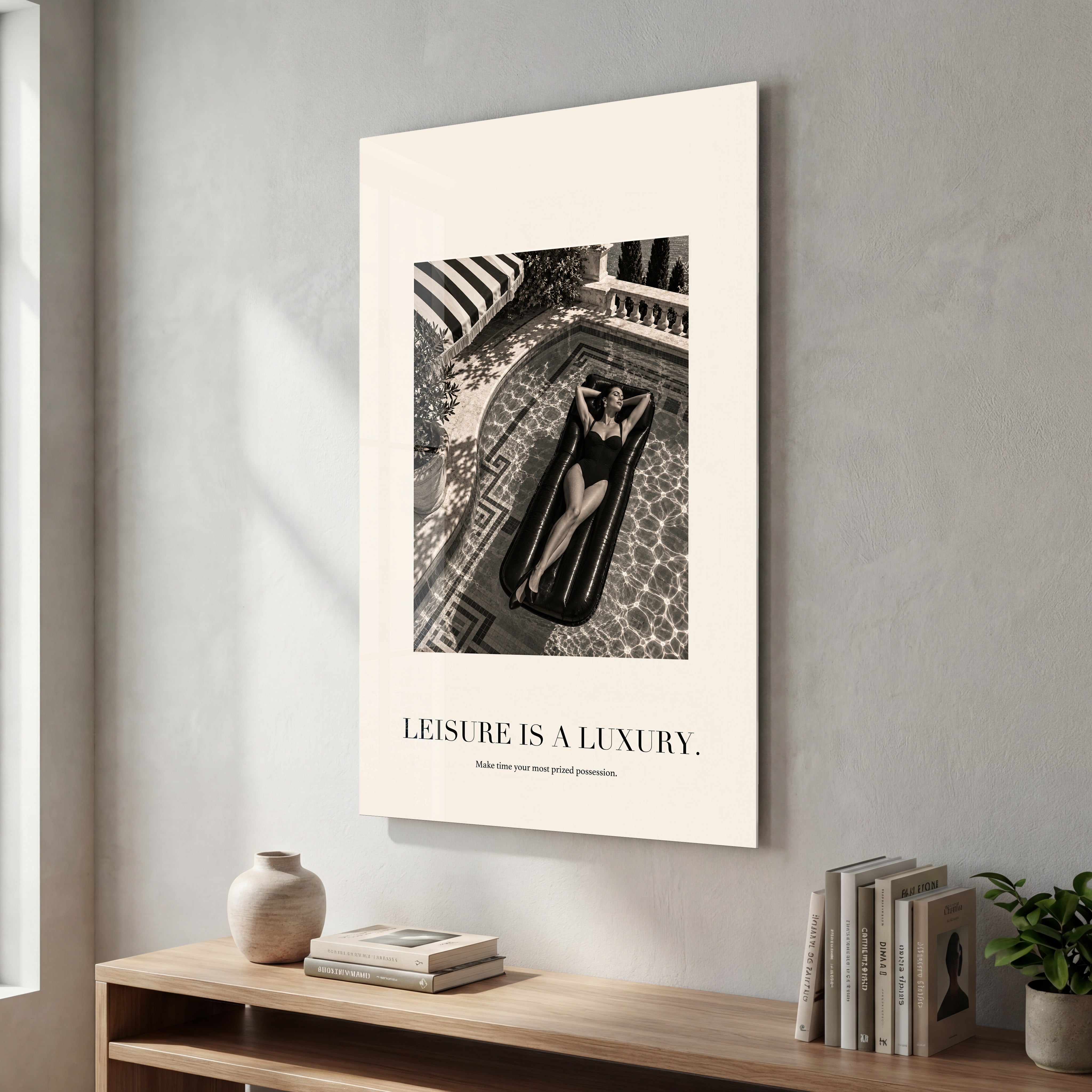 Leisure Is a Luxury glass wall art by Artdesigna, featuring elegant typography on a clear glass panel