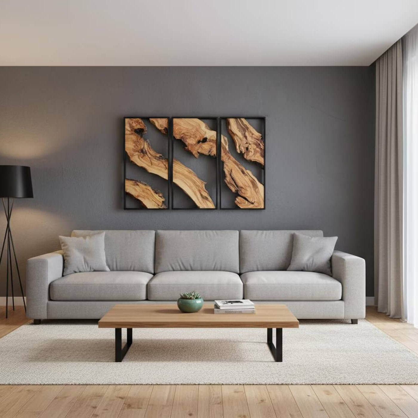 Modern living room with a gray sofa, wooden coffee table, and wall art.
