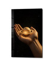 Saturn in the Palm glass wall art by Artdesigna, studio view
